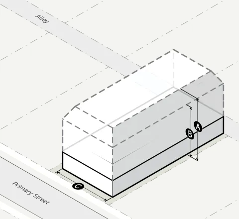 A white building is shown on a street.

Description generated by AI